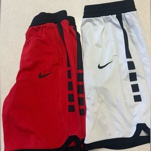 Bundle includes two pairs of YOUTH XL Nike Dri-FIT basketball shorts.